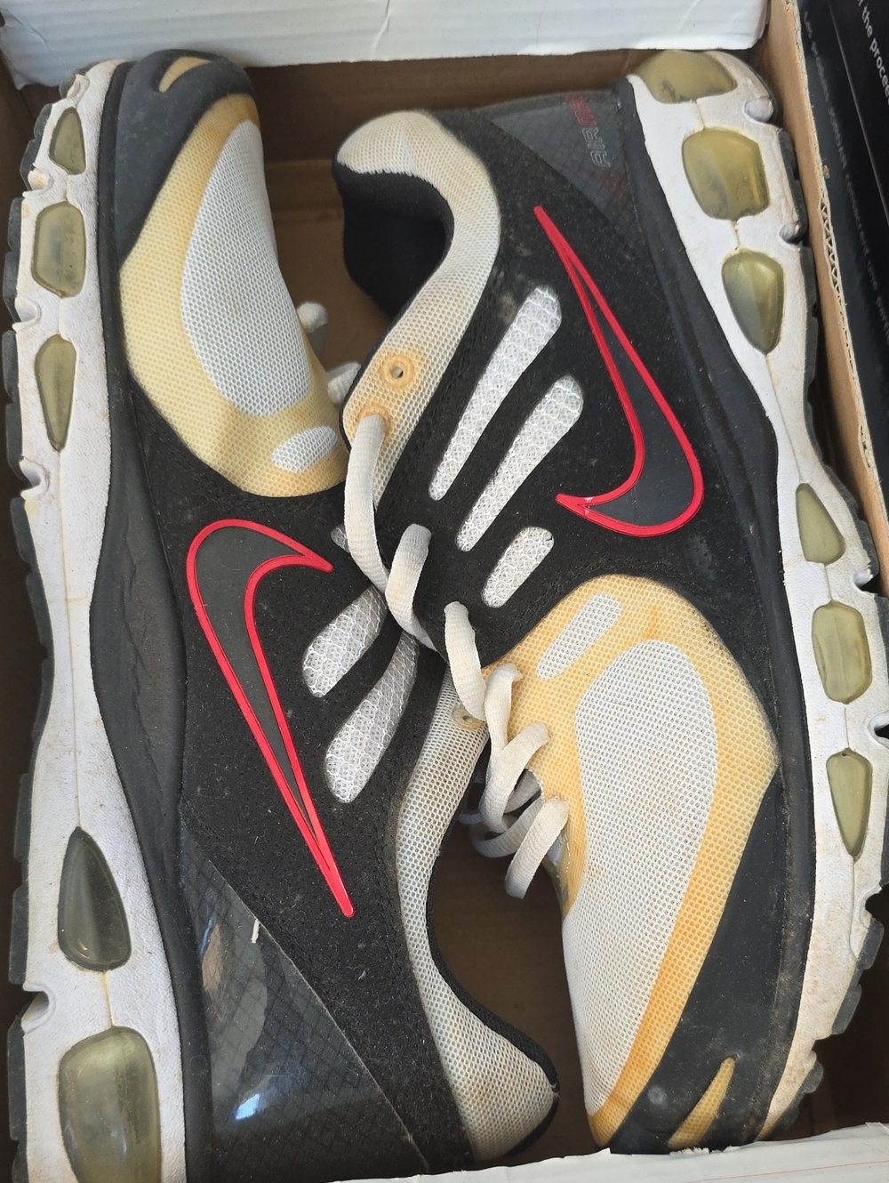 Nike Men’s Black, White and Yellow Athletic Running Shoes with Red Swoosh